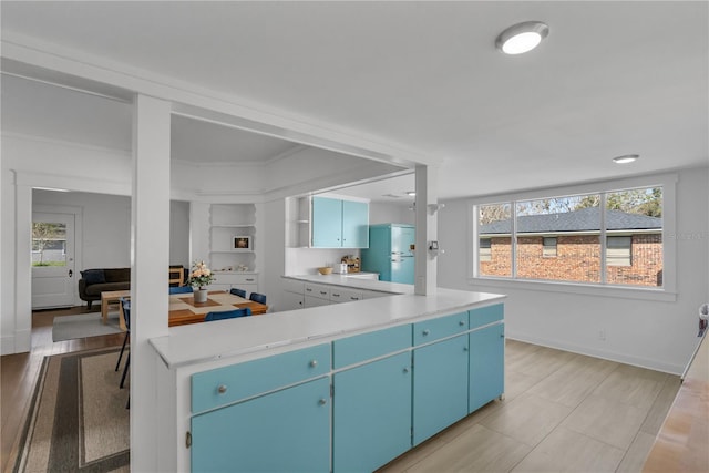 kitchen with blue cabinets