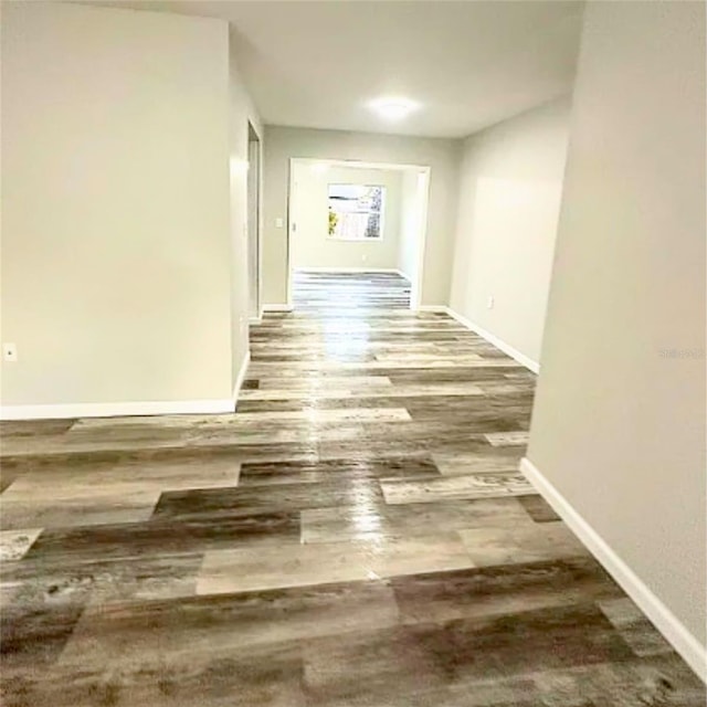 corridor featuring hardwood / wood-style floors