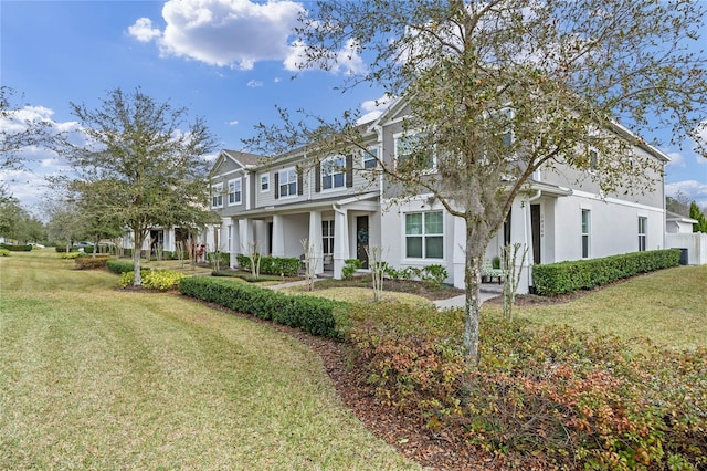 view of front of home with a front lawn