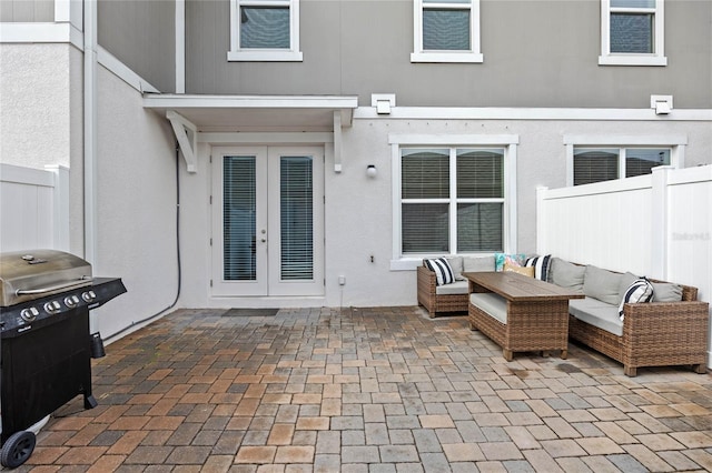 view of patio featuring french doors, grilling area, and an outdoor hangout area