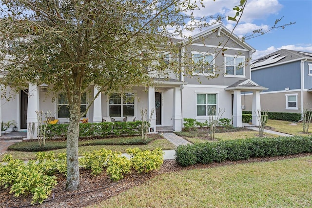 view of front of house featuring a front lawn