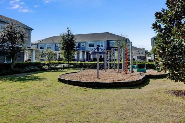 view of play area featuring a lawn