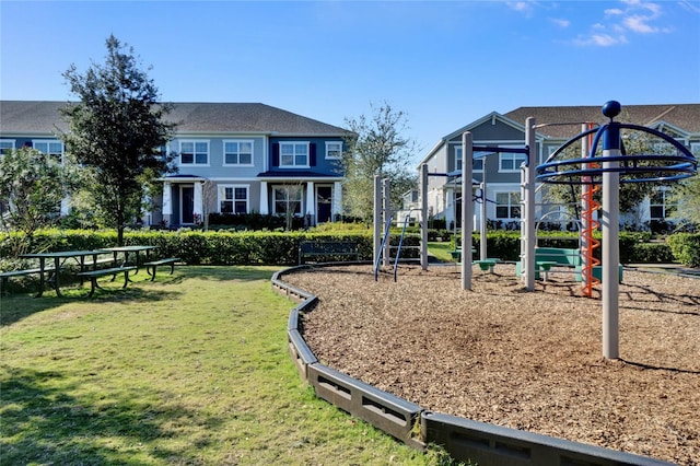 view of playground with a yard