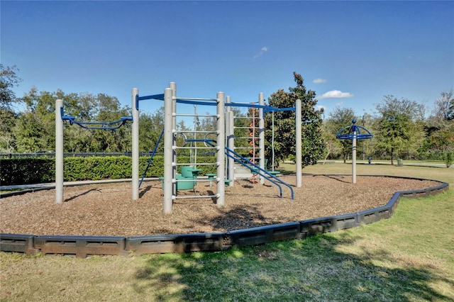 view of playground with a lawn