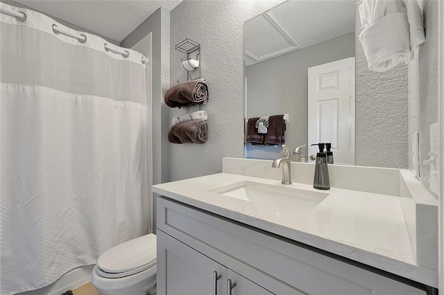 full bathroom featuring vanity, toilet, shower / tub combo, and a textured ceiling