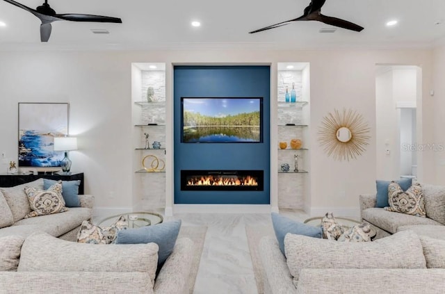 living room with crown molding and ceiling fan