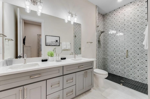 bathroom featuring walk in shower, vanity, and toilet