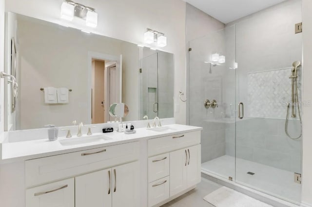 bathroom featuring vanity and walk in shower