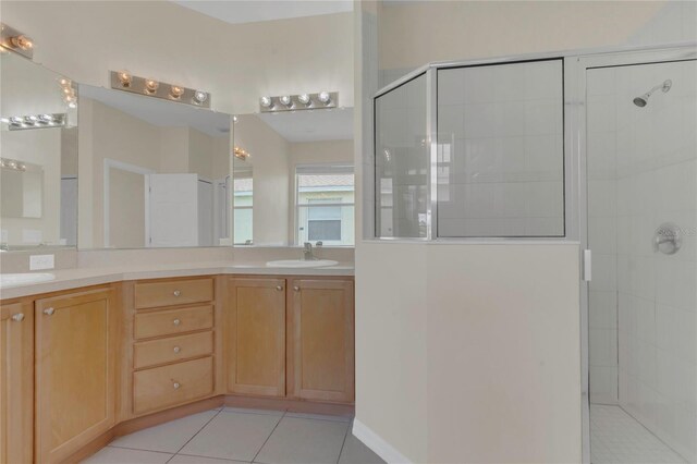 11530 57th Street Cir E, Parrish, FL 34219 - bathroom with tiled shower, double vanity, and tile patterned floors