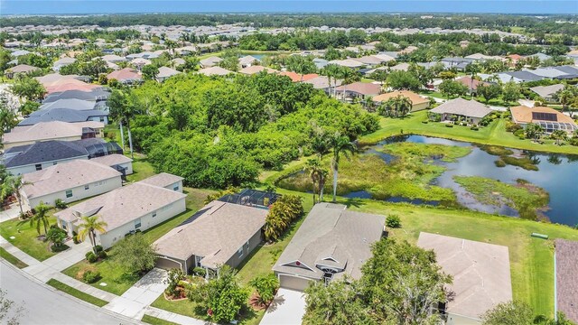 11530 57th Street Cir E, Parrish, FL 34219 - aerial perspective of suburban area with a large body of water