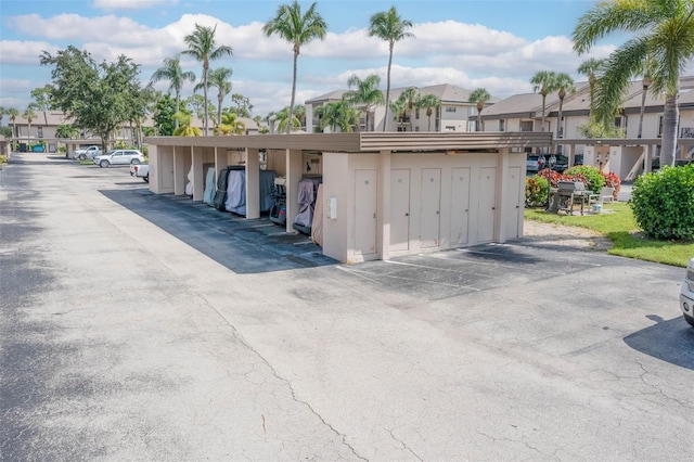 view of car parking with a carport