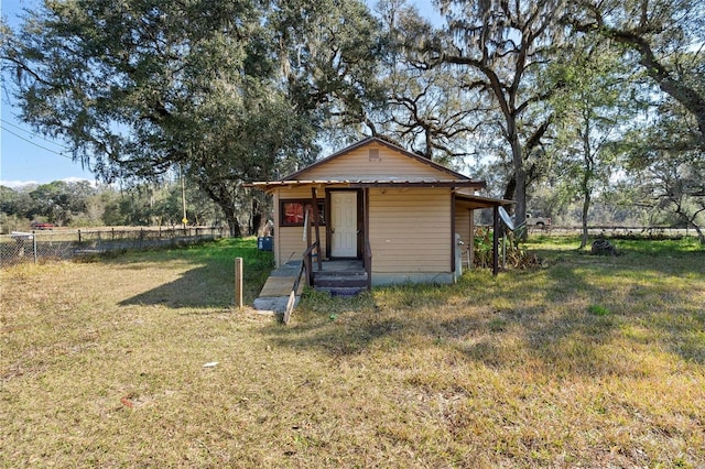 view of outdoor structure featuring a yard