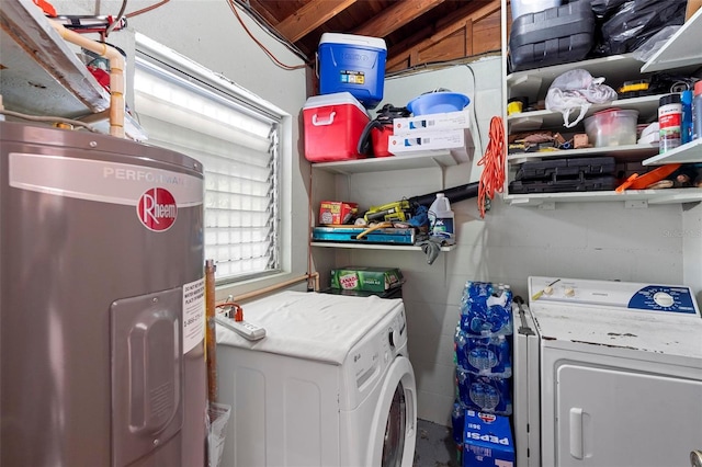 clothes washing area with separate washer and dryer and electric water heater