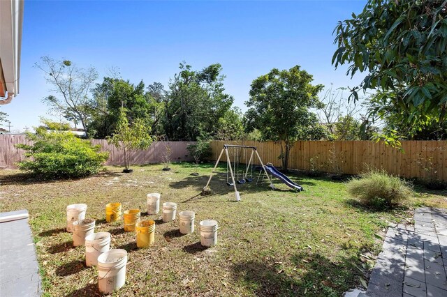 view of yard with a playground