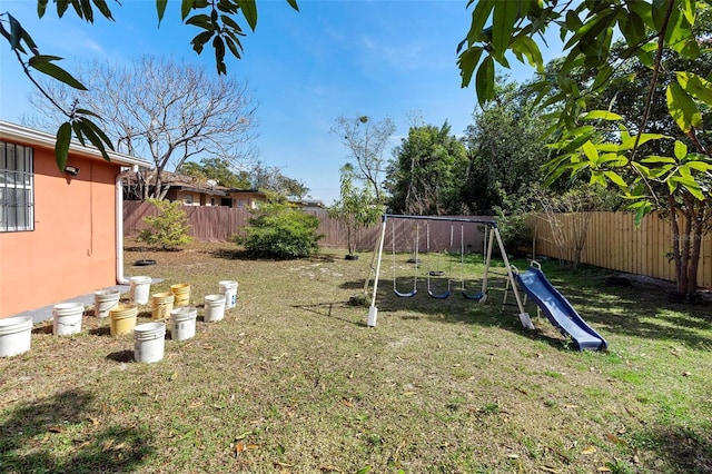 view of yard with a playground