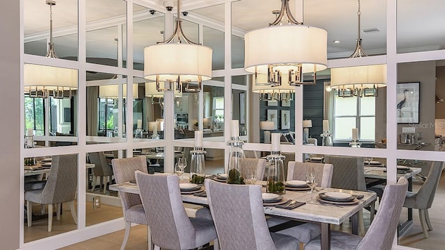 dining space featuring an inviting chandelier