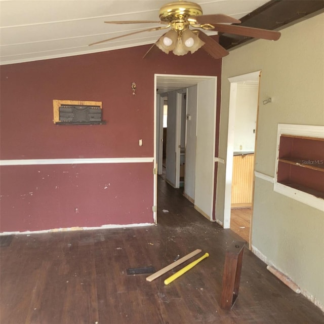 spare room featuring ceiling fan and dark hardwood / wood-style flooring