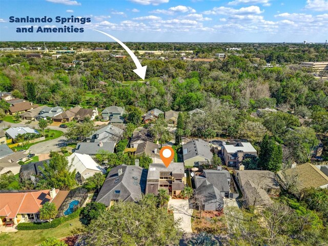 birds eye view of property with a residential view