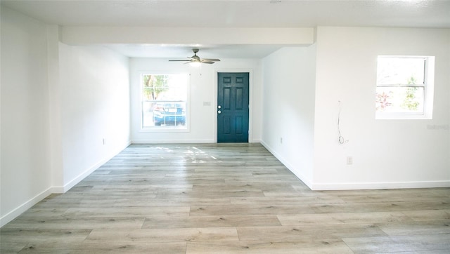 interior space featuring ceiling fan and light hardwood / wood-style flooring