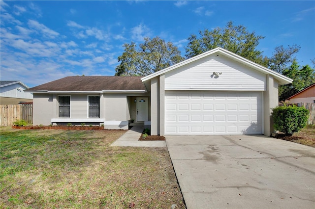 single story home with a garage and a front yard