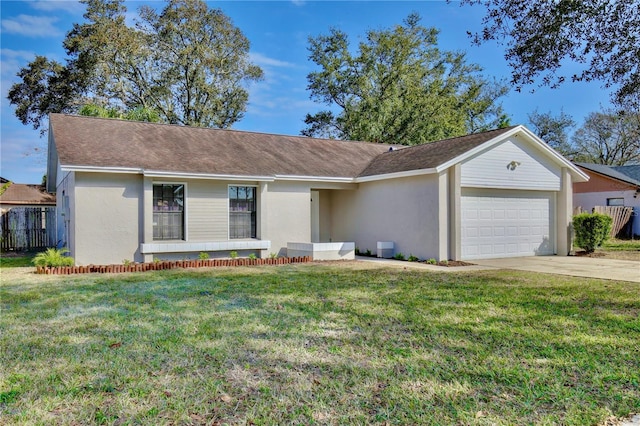 single story home featuring a garage and a front yard