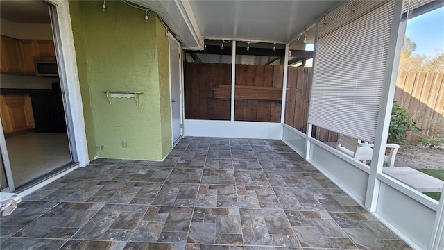 view of unfurnished sunroom