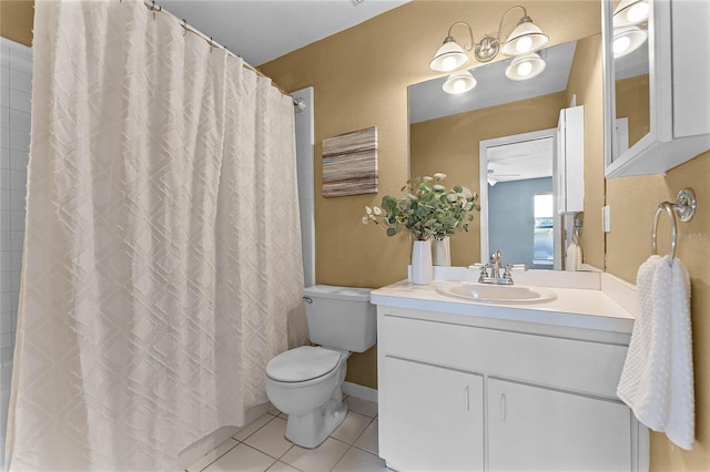 bathroom featuring toilet, vanity, curtained shower, ceiling fan, and tile patterned flooring