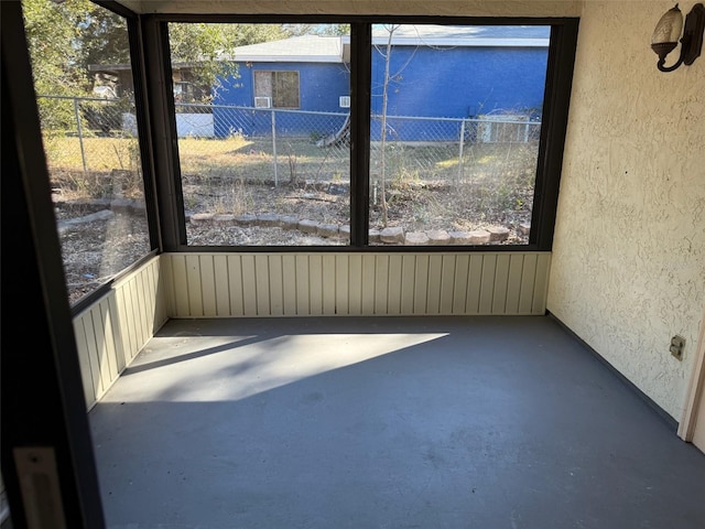 unfurnished sunroom with radiator