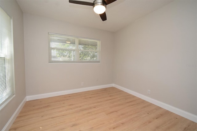 unfurnished room featuring ceiling fan and light wood-type flooring