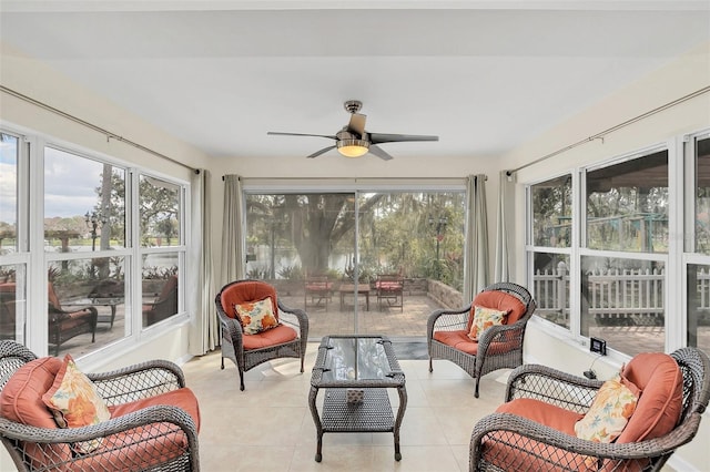 sunroom with ceiling fan