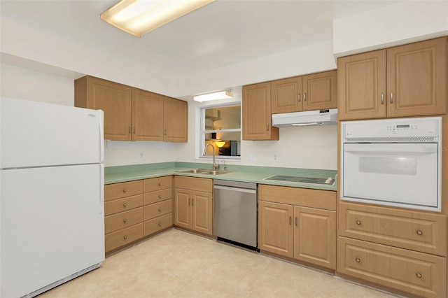 kitchen featuring sink and white appliances