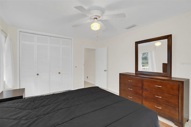 unfurnished bedroom featuring a closet and ceiling fan