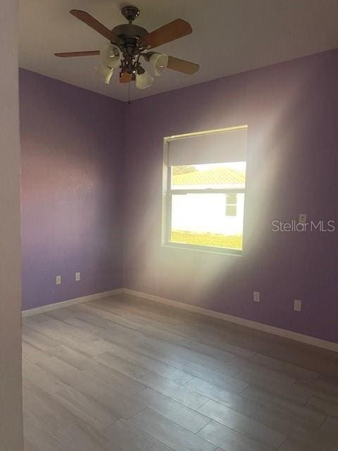 empty room with ceiling fan