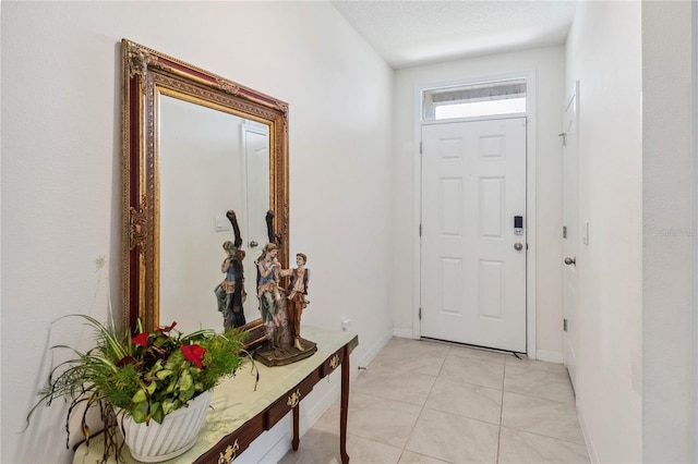 view of tiled foyer entrance