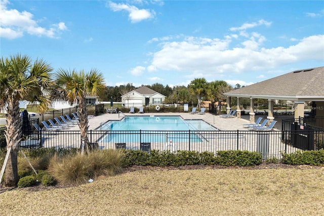 view of swimming pool with a patio area