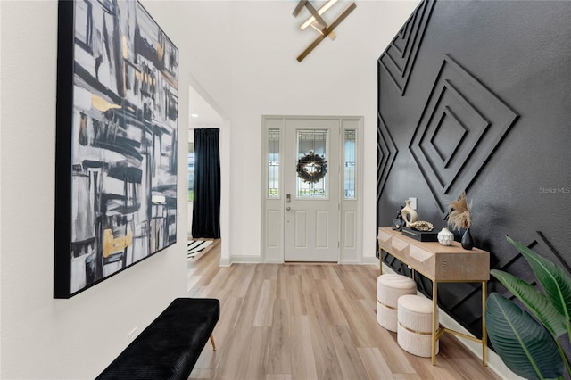 foyer entrance with light wood-type flooring