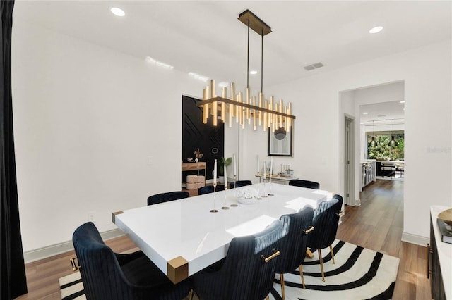 dining room featuring light hardwood / wood-style flooring