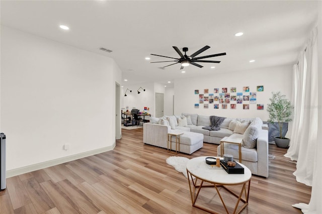 living room with light hardwood / wood-style floors