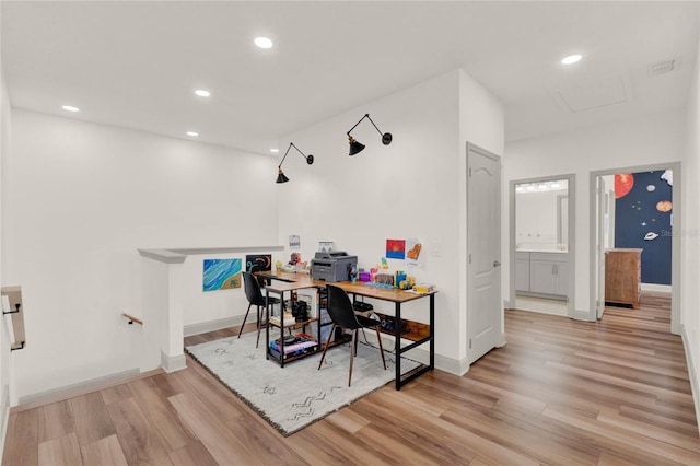 home office featuring light hardwood / wood-style flooring