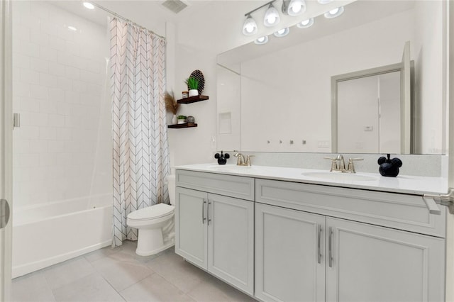 full bathroom featuring toilet, vanity, shower / bathtub combination with curtain, and tile patterned flooring