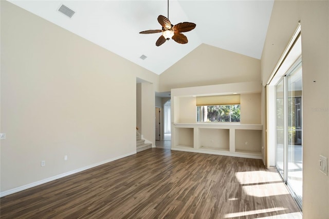 empty room with ceiling fan, dark wood-type flooring, and high vaulted ceiling