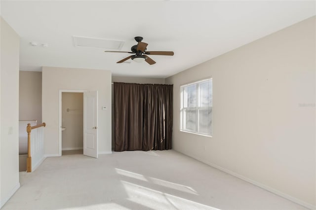 spare room with light colored carpet