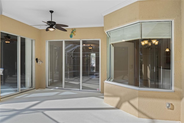 view of patio with ceiling fan