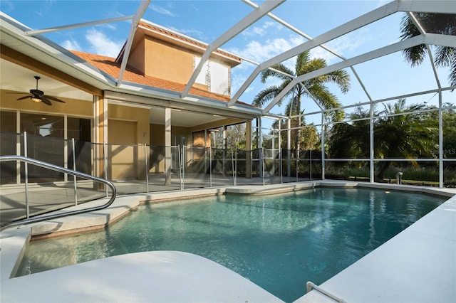 view of pool featuring a patio, a lanai, and ceiling fan