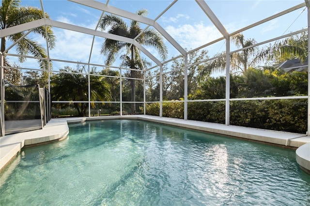 view of swimming pool with a lanai