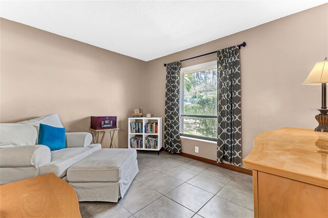 3547 Medford Rd, Casselberry, FL 32707 - sitting room with baseboards and light tile patterned floors
