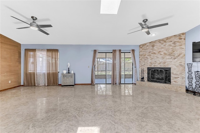 3547 Medford Rd, Casselberry, FL 32707 - unfurnished living room with a ceiling fan, lofted ceiling, a large fireplace, marble finish flooring, and a skylight