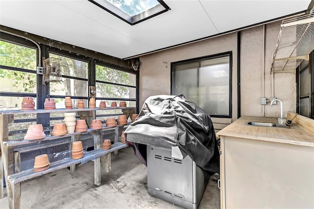 3547 Medford Rd, Casselberry, FL 32707 - sunroom featuring a sink and a skylight