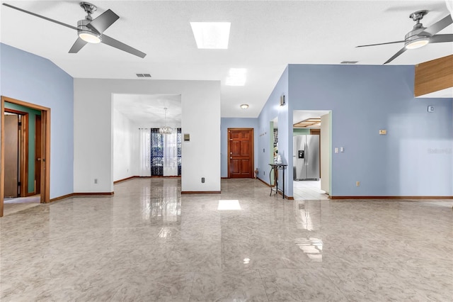 3547 Medford Rd, Casselberry, FL 32707 - unfurnished living room featuring ceiling fan, a skylight, a chandelier, and light marble finish flooring