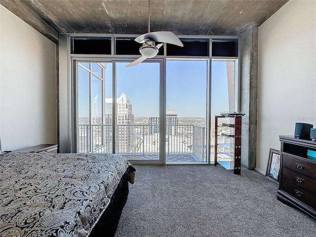 bedroom featuring ceiling fan, floor to ceiling windows, access to exterior, and carpet